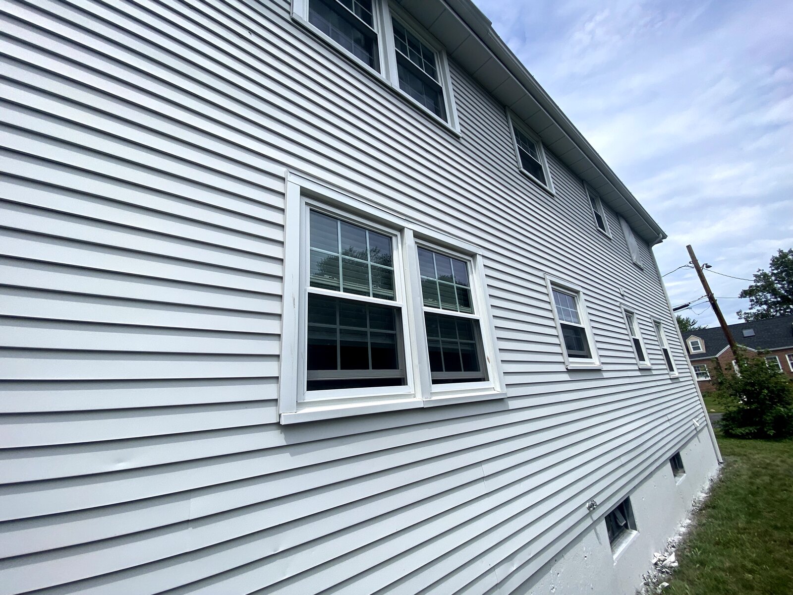Finished siding & white trim
