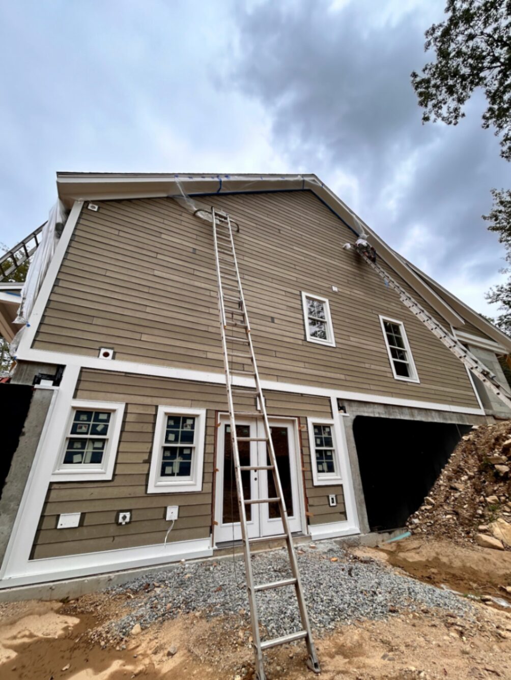 Full exterior house repaint — before